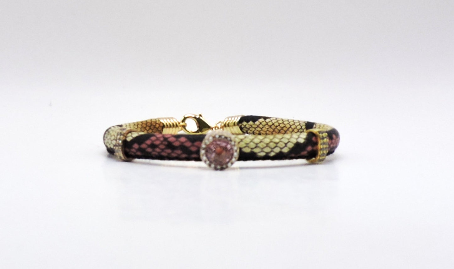Silver bracelet in gold with a snake strap with semiprecious stones and zircons