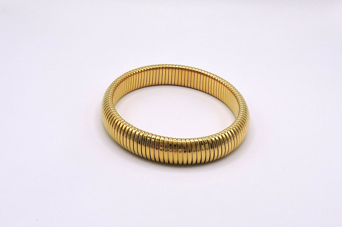 Wide elastic bracelet in gold-filled