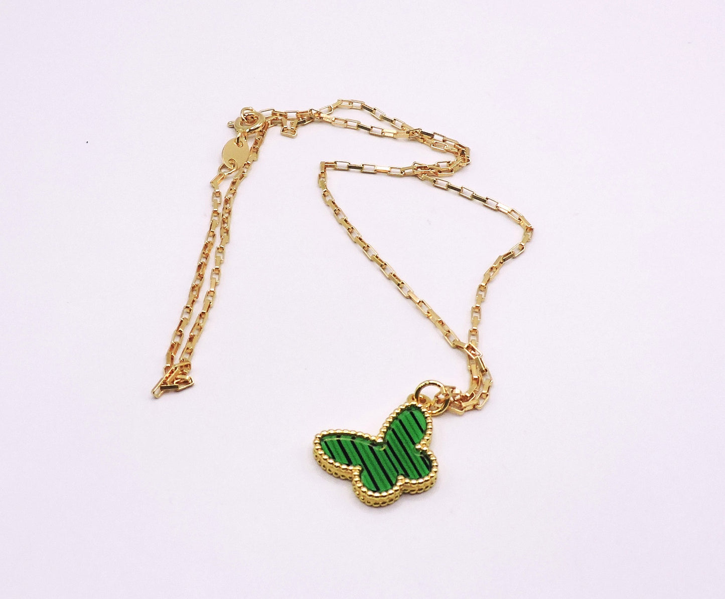 Green butterfly necklace in gold-filled