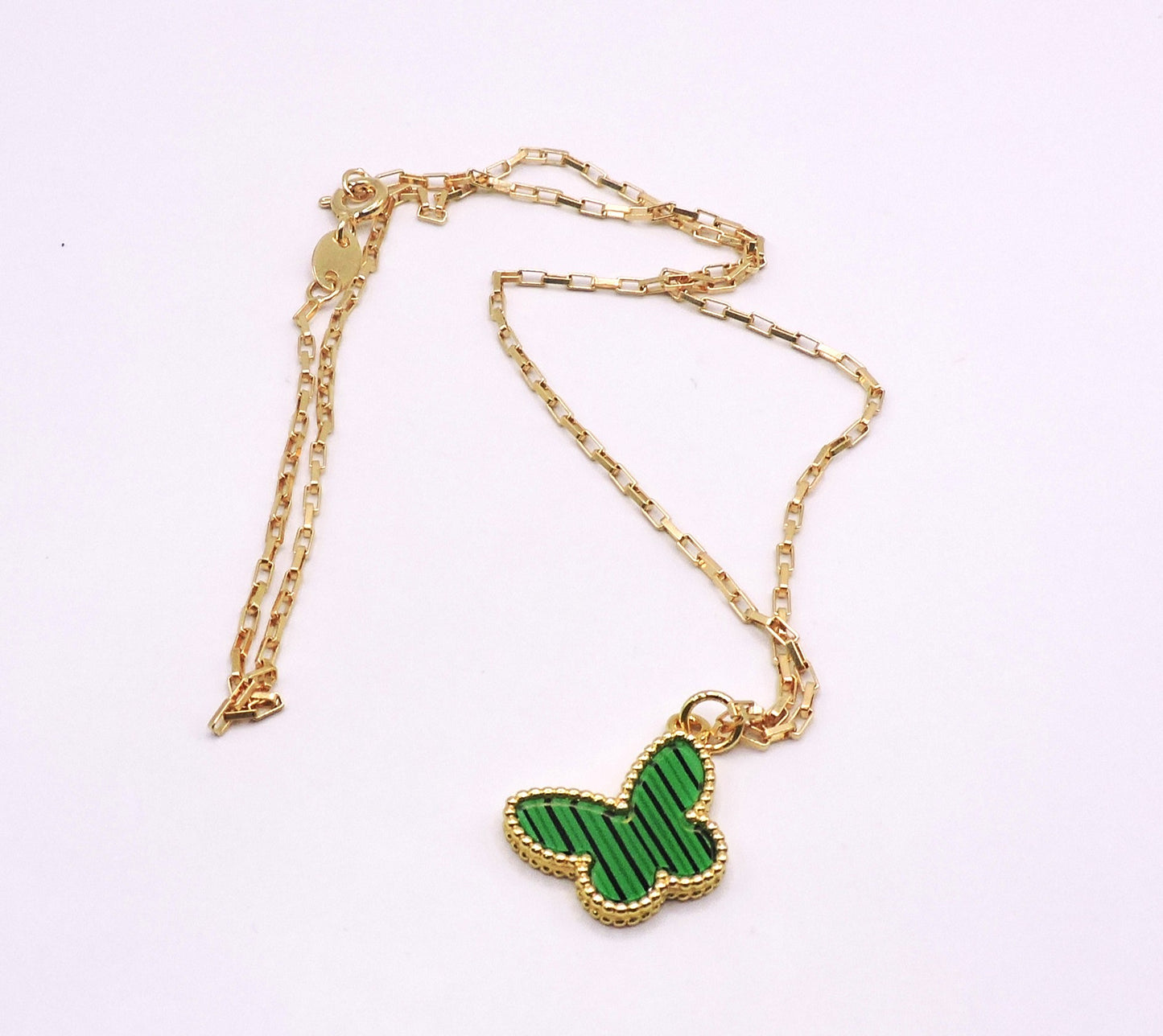 Green butterfly necklace in gold-filled