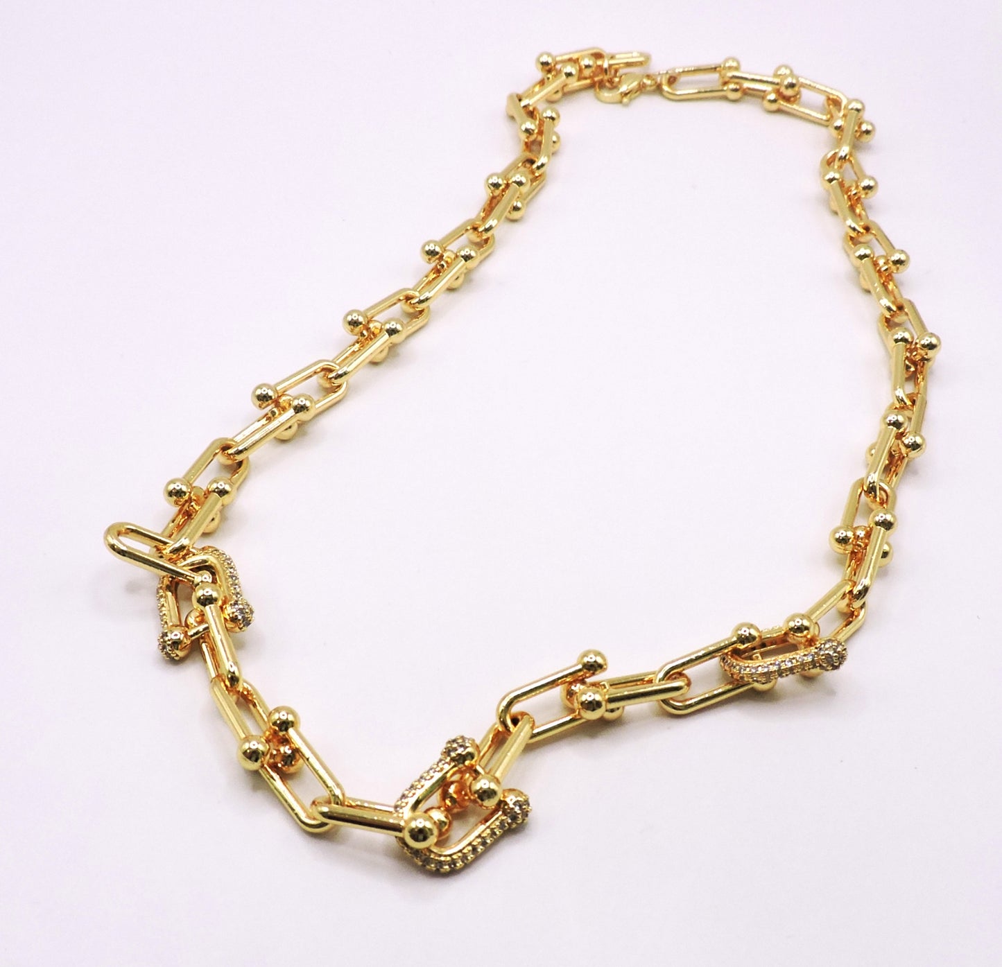 U-shaped necklace with micro pave inlays in gold filled