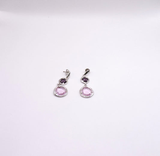 Silver earring with pink semiprecious stone and zircons.