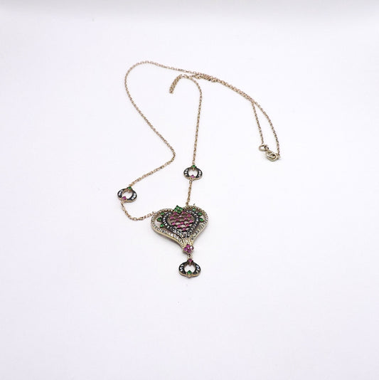 Gold-plated silver heart-shaped necklace with semi-precious stones.