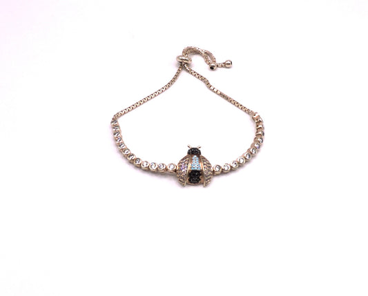 Rose gold silver bracelet with a Lady bag and zircons
