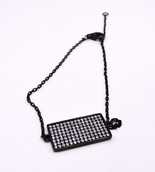 Black square silver bracelet with zircons.