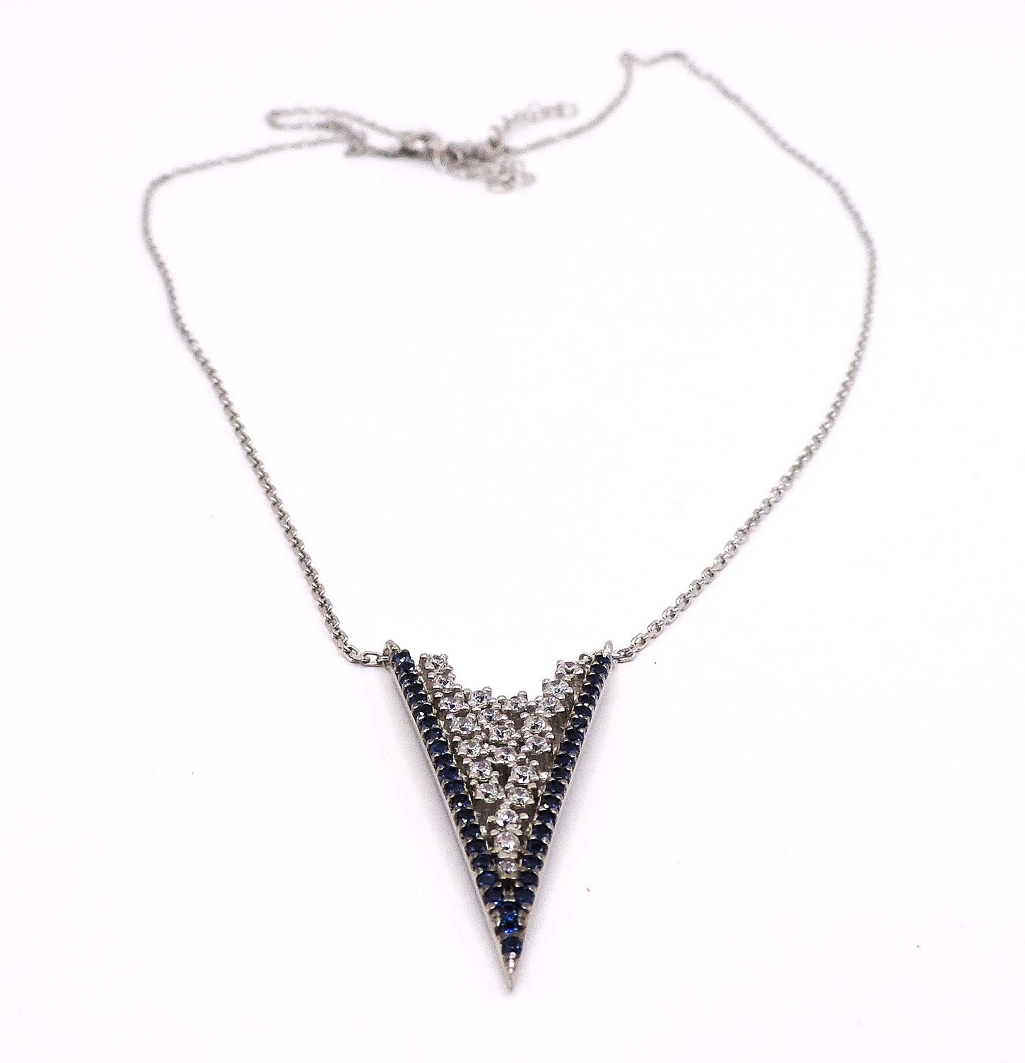 White and blue zircon necklace in silver in the shape of an arrowhead