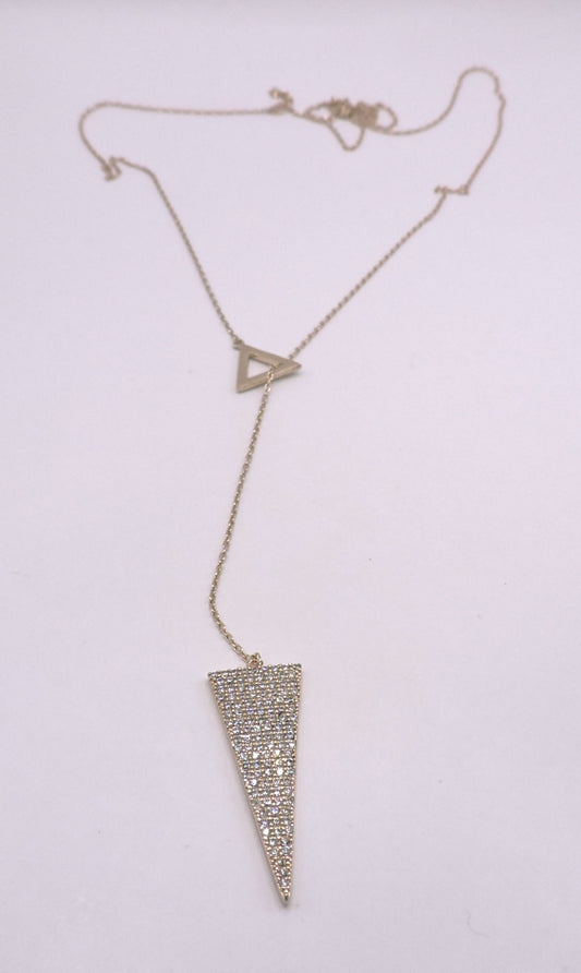 Rose gold silver necklace in the shape of an arrowhead, passed through a triangle.