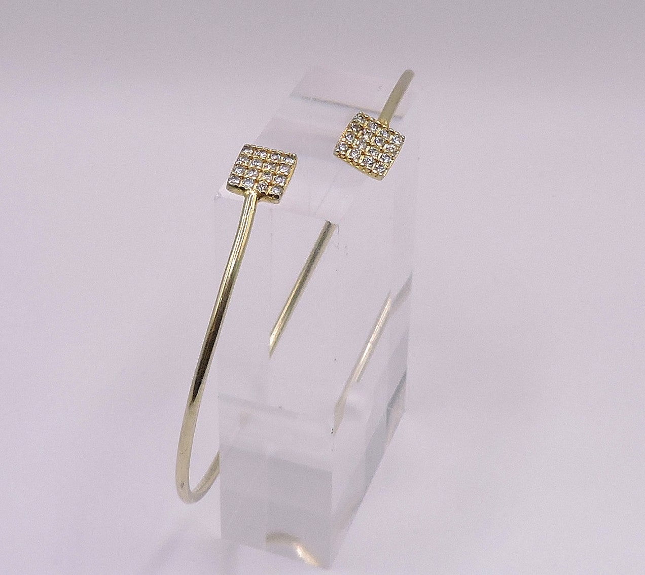 Gold-plated silver cuff with square-shaped zircons