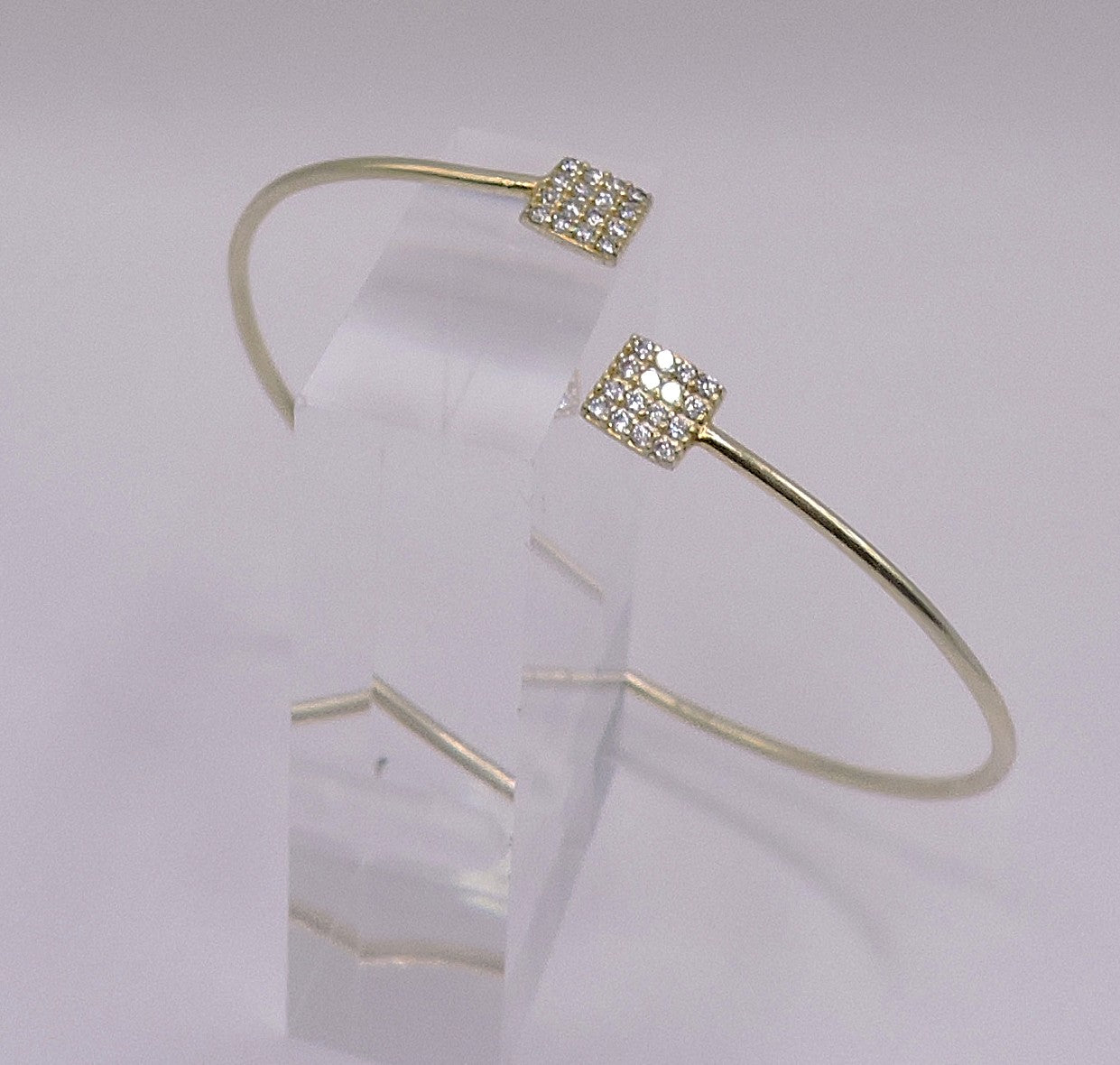Gold-plated silver cuff with square-shaped zircons