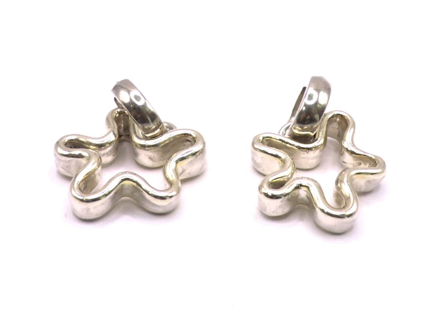 Flower-style earrings with small gold plating by an Israeli designer