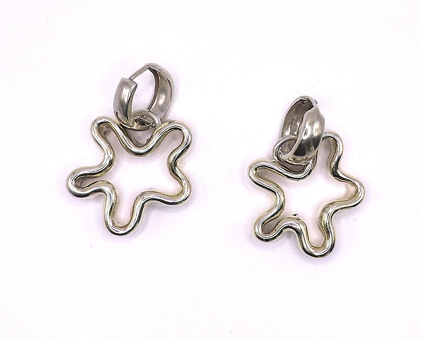 Flower-style earrings with small gold plating by an Israeli designer