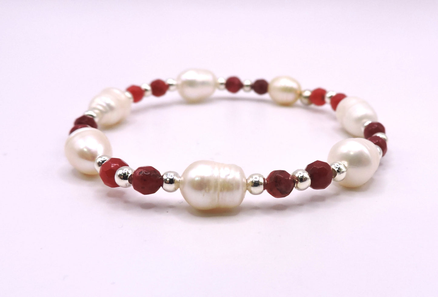 River pearl bracelet with real red stones.