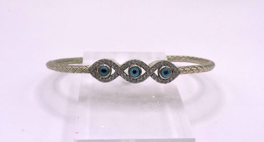 3-eye bracelet in light gold-plated silver with zircons.