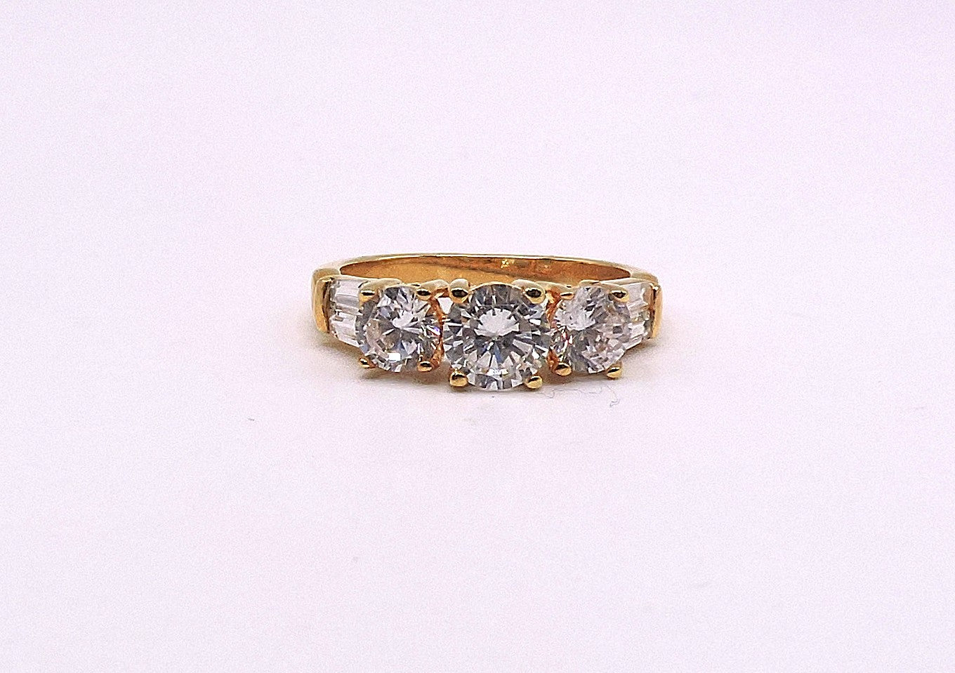 Gold-filled ring with 3 cubic zirconia stones and baguettes Size 7