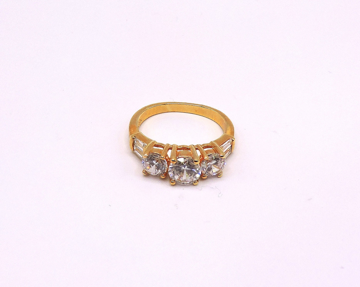 Gold-filled ring with 3 cubic zirconia stones and baguettes Size 7