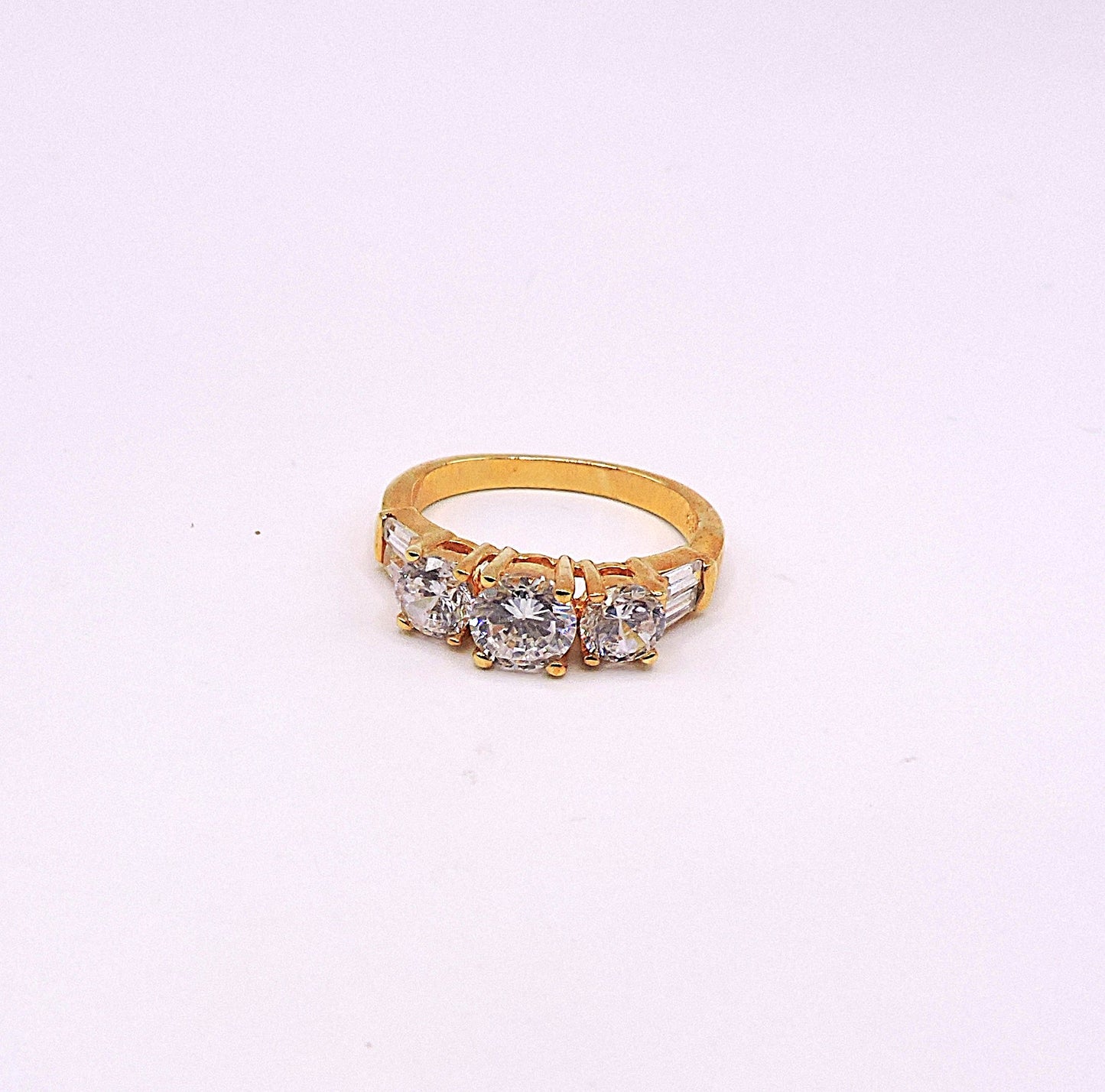 Gold-filled ring with 3 cubic zirconia stones and baguettes Size 7
