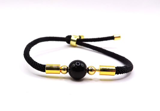 Adjustable cord bracelet with real black stone.